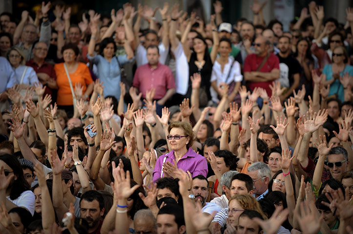 24 hours in pictures: demonstrators gather on the Puerta del Sol square, Madrid
