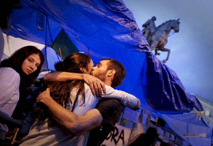 24 hours in pictures: Protesters occupy the Puerta del Sol  in Madrid