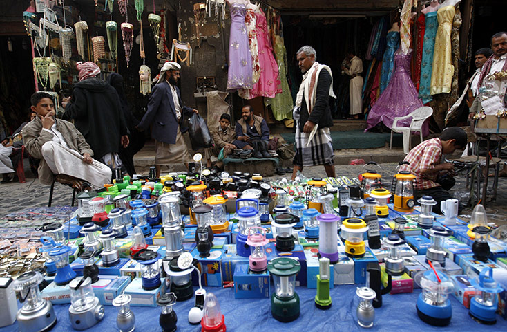 Yemen: A stall displays battery-operated lanterns at a market in Sana'a