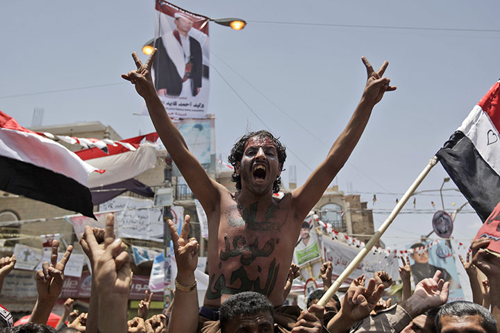 Yemen: An anti-government protester shouts slogans