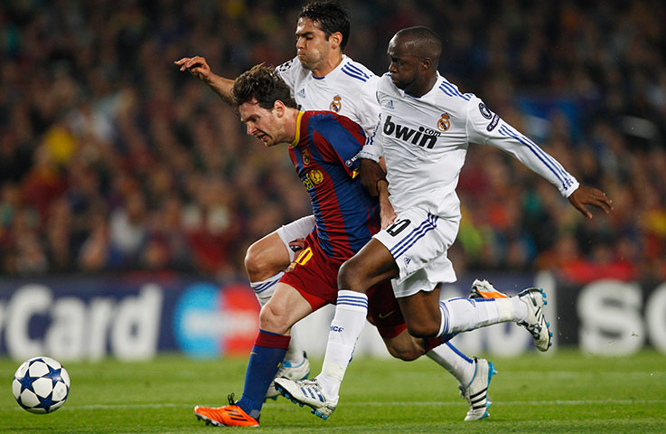 Barcelona v Real Madrid: Lionel Messi uses his skill and pace to get past Lassana Diarra and Kaka