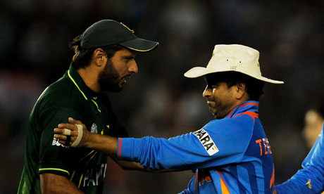 Captain Shahid Afridi of Pakistan congratulates Sachin Tendulkar of India 