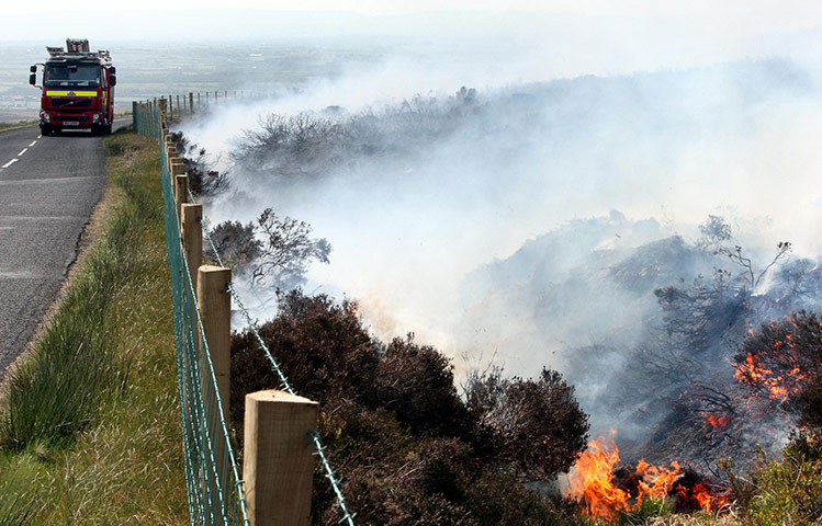 Wild fires: Firefighters try to contain gorse fires in the hills above Loughguile 