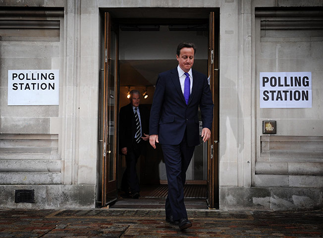AV elections: Prime Minister David Cameron leaves a polling station in Westminster