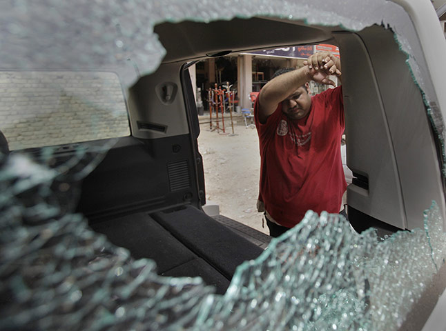 24 hours in pictures: roadside bomb attack in Baghdad, Iraq