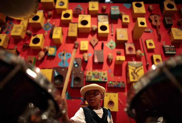 24 hours in pictures: Boy plays drums lays drums at Geffen Contemporary Art Museum, Los Angeles