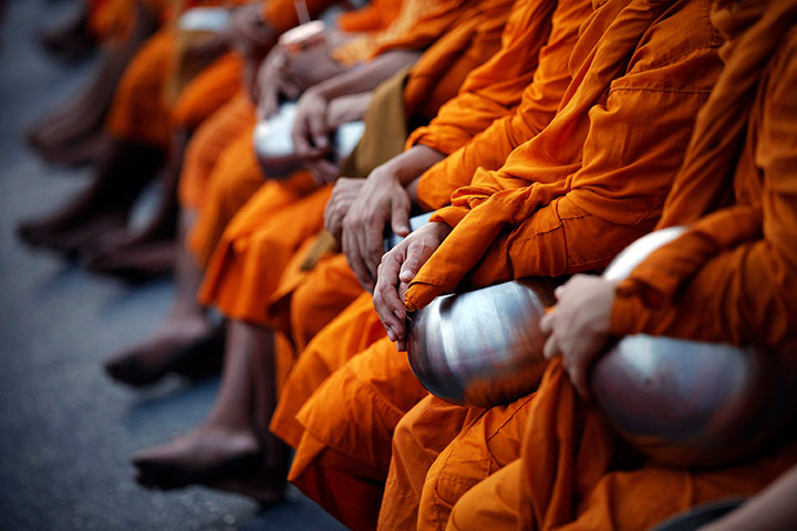 24 hours in pictures: Buddhist monks attend an alms offering ceremony in Bangkok