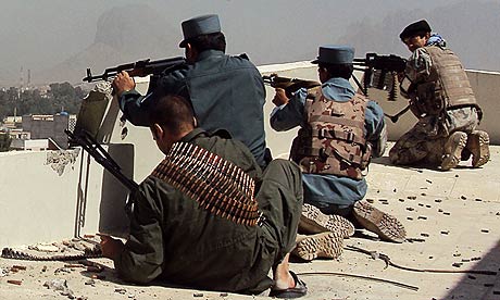 Afghan police fire towards Taliban fighters in Kandahar