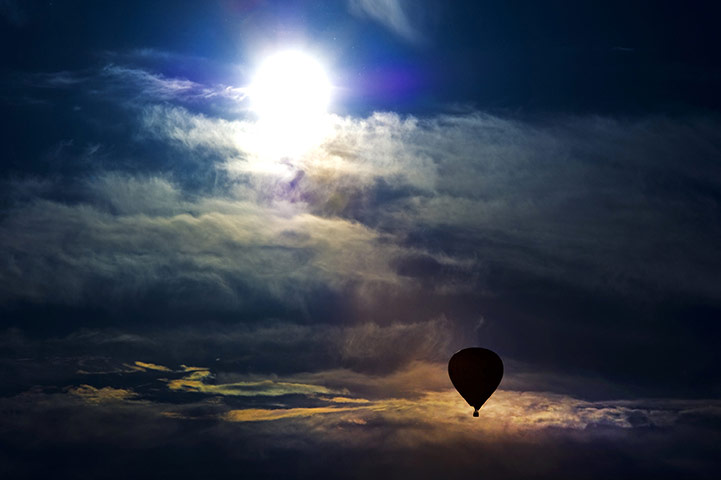 24 hours in pictures: Dresden, Germany: A hot-air balloon flies through the sky