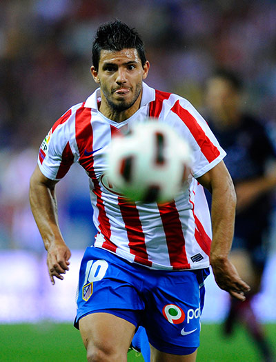 Top 50 transfer targets: Atletico Madrid's forward Sergio Kun Aguero eyes the ball