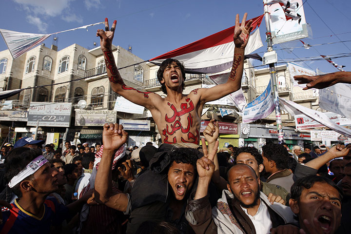 Yemen fighting: A Yemeni anti-government protester in Sana'a