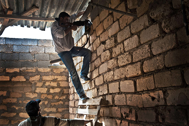 24 Hours in Pix: Libyan fighters