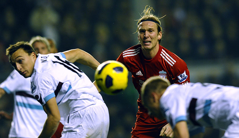 Unwanted players transfer: Liverpool midfielder Christian Poulsen watches his shot go wide