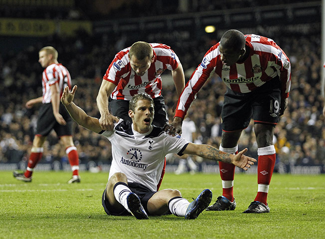 Unwanted players transfer: Tottenham's David Bentley reacts after a challenge in the penalty box