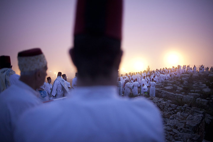 24 hours: West Bank: Members of the Ancient Samaritan community pray at a pilgrimage