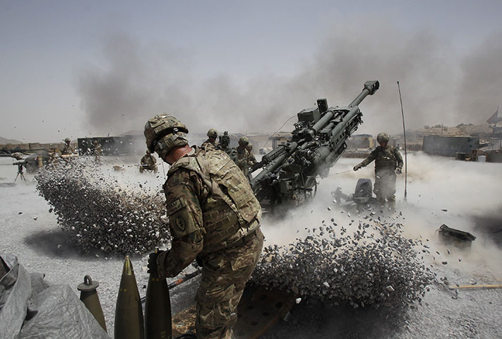 24 hours: Afghanistan: US Army soldiers fire a howitzer artillery at Seprwan Ghar 
