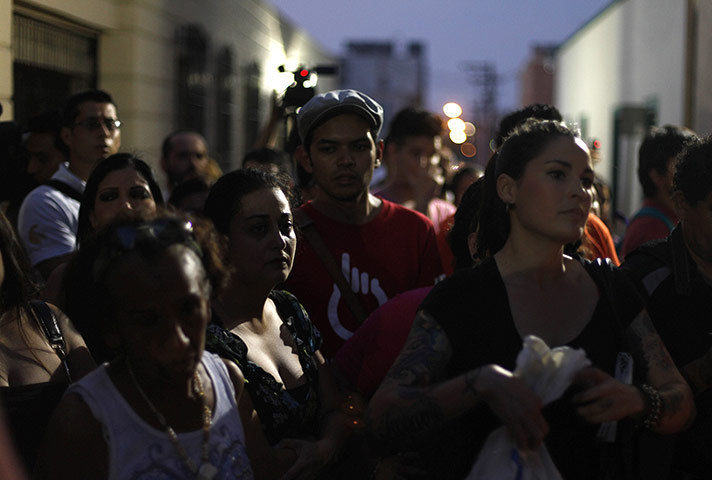 FTA: Tomas Bravo: People take part in a peaceful demonstration outside the Cafe Iguana bar
