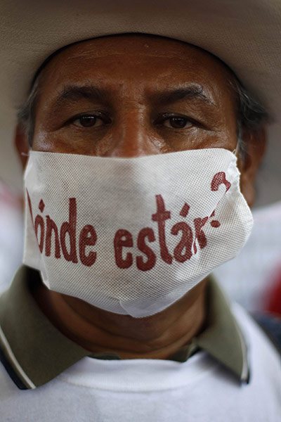 FTA: Tomas Bravo: A relative of a disappeared man takes part in a peaceful protest in Torreon