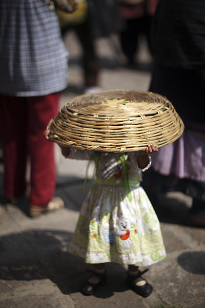 24 hours in pictures: A tortilla vendor's child in Mexico City