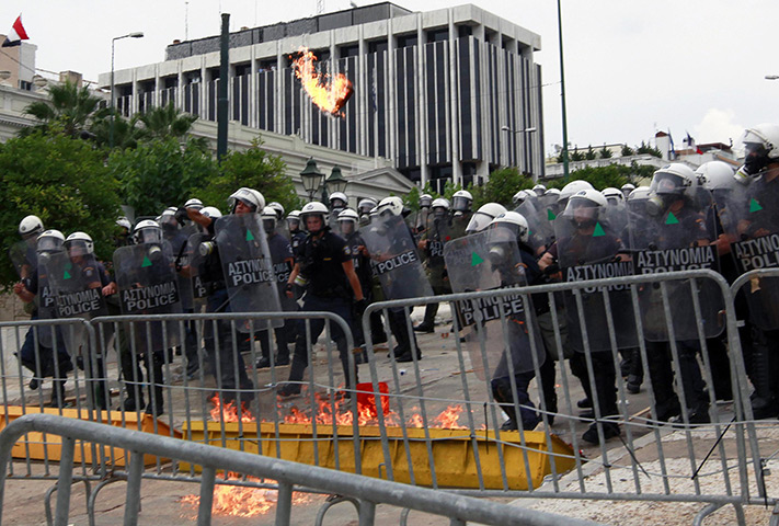 Protests in Greece: Protesters clash with police outside the Greek parliament in Athens