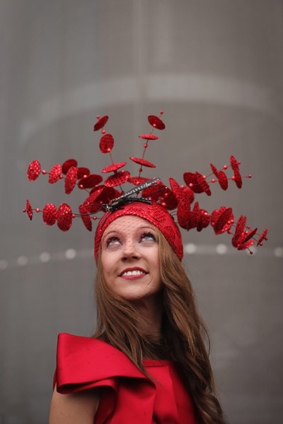 Ascot Ladies Day: A racegoer poses for a photograph