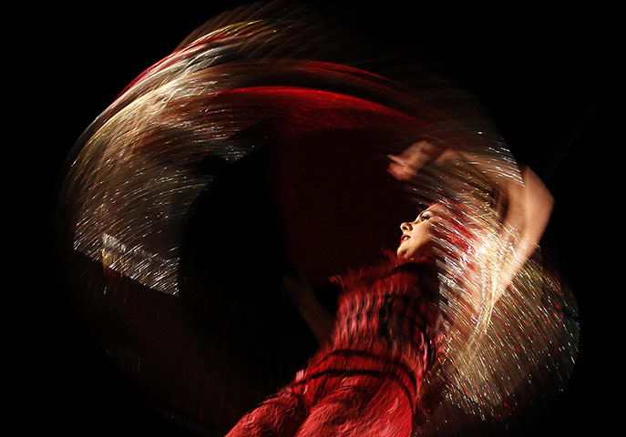 24 hours: A Cirque Du Soleil  cast member  preforms during a dress rehearsal 