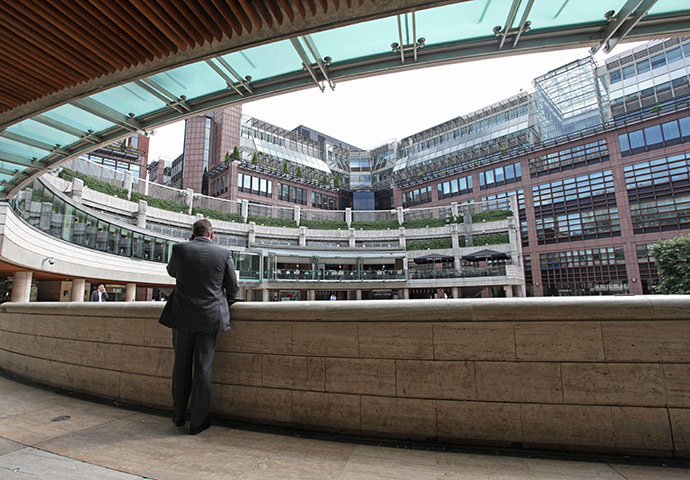 Week in Business: A businessman uses his mobile phone at the Broadgate development