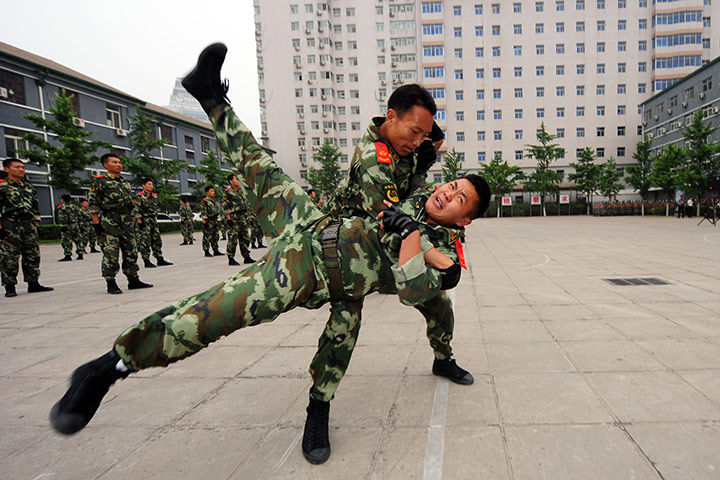 24 hours in pictures: Chinese paramilitary police show off their skills at training session