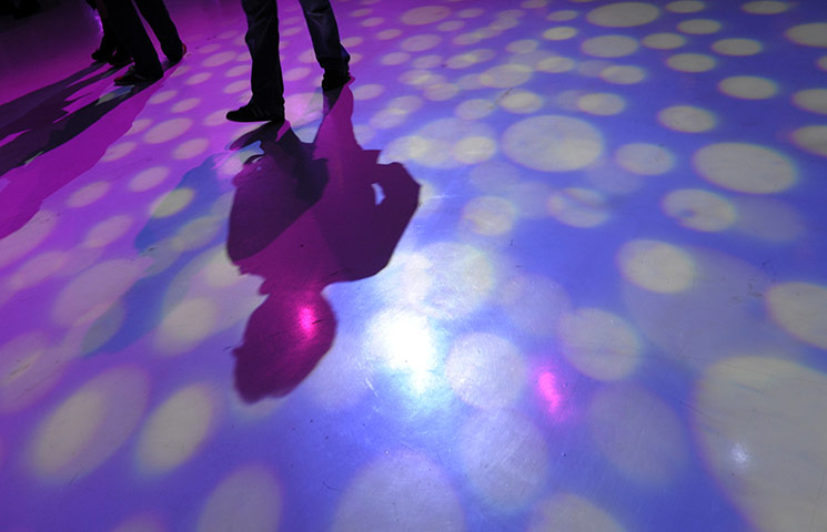 Sonar festival: Festival goers walk through a light show in La Coruna