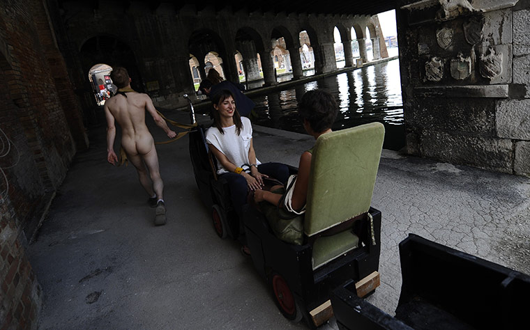 Venice Biennale: Visitors are taken on a replica of a gondola as part of a performance
