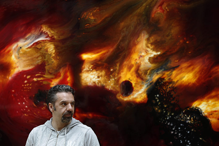 Summer Exhibition: Artist Keith Tyson poses with his artwork 'Deep Impact'