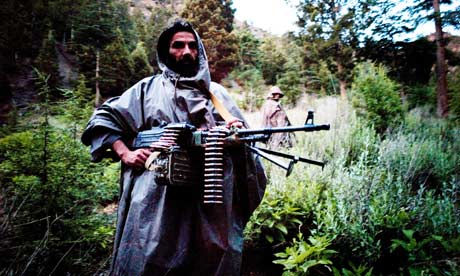 Haqqani Taliban fighters in their mountain camp in eastern Afghanistan