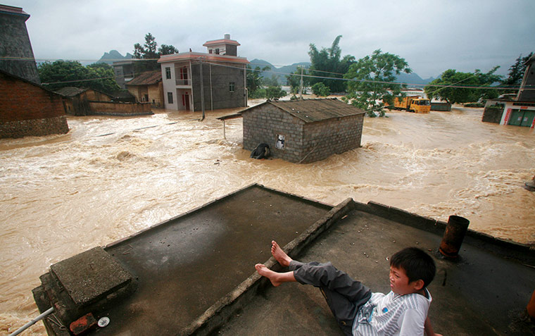 Floods in China: Torrential rains batter parts of China, floods spread