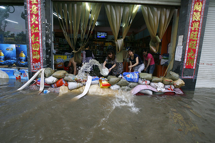 Floods in China: flood water along a street in Wuhan , Hubei province