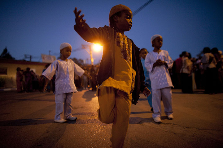 24 hours: Dimona, Israel: Members of the Black Hebrews community celebrate Shavuot