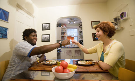 A couple eating at home