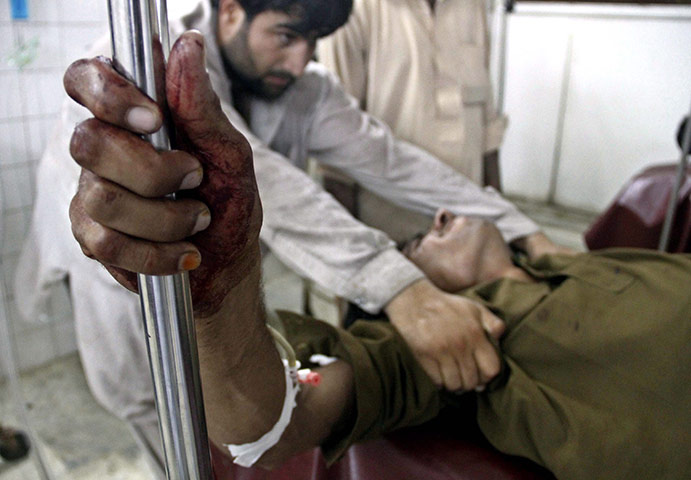 24 hours in pictures: Suicide bomb blast in Pakistan