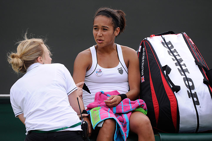 Wimbledon day 3: Heather Watson gets treated for an elbow injury