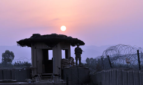 US soldier stands on a guard tower in Khost province, eastern Afghanistan