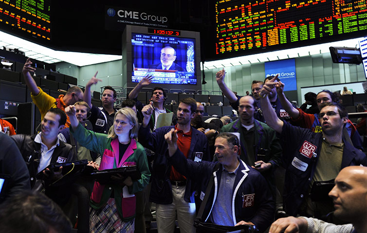 Week in Business: Ben Bernanke appears on a video at the CME Group Chicago Board of Trade