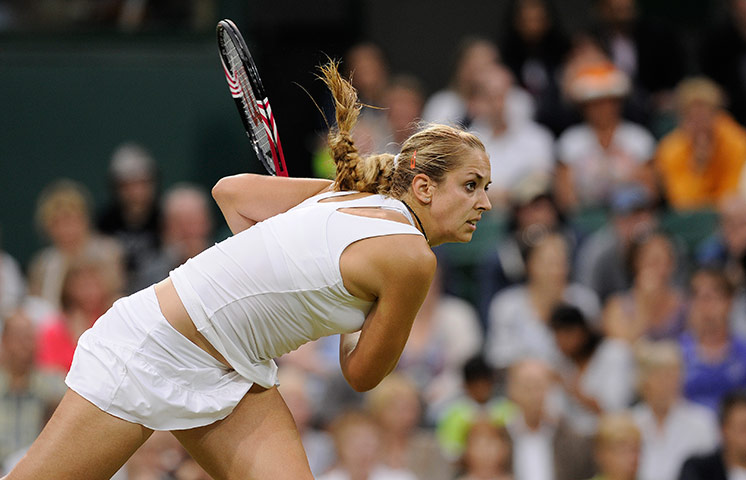 Wimbledon day 4: Sabine Lisicki serves during her win over Li Na