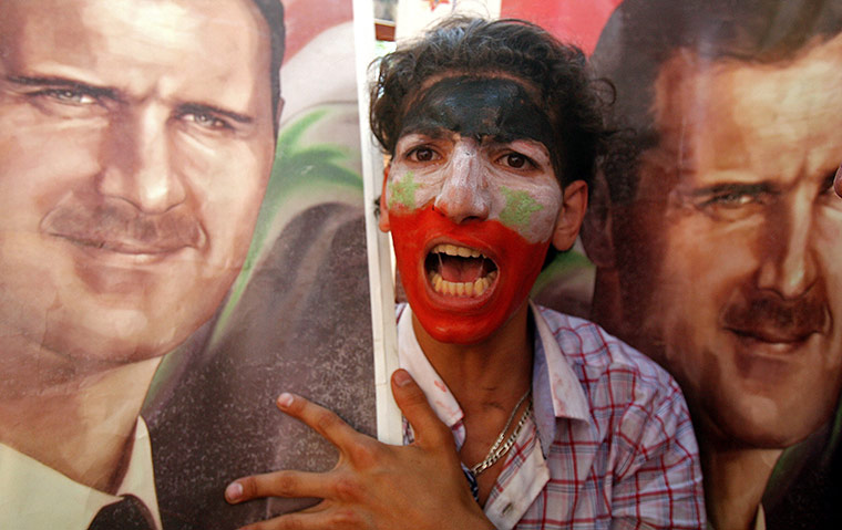 24 Hours In Pix: Syrian demonstrator