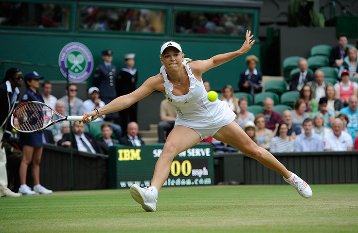 Wimbledon day 6: Caroline Wozniacki in action against Jarmila Gajdosova