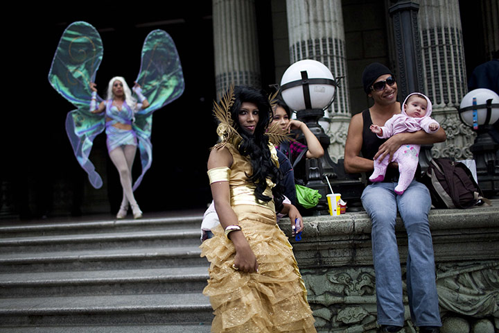 Gay Pride: People look on after a gay pride parade in Guatemala City
