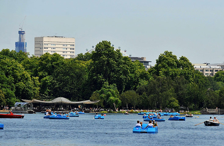 Hot Weather: Pedelos and rowing boats fill the Serpentine in Hyde Park