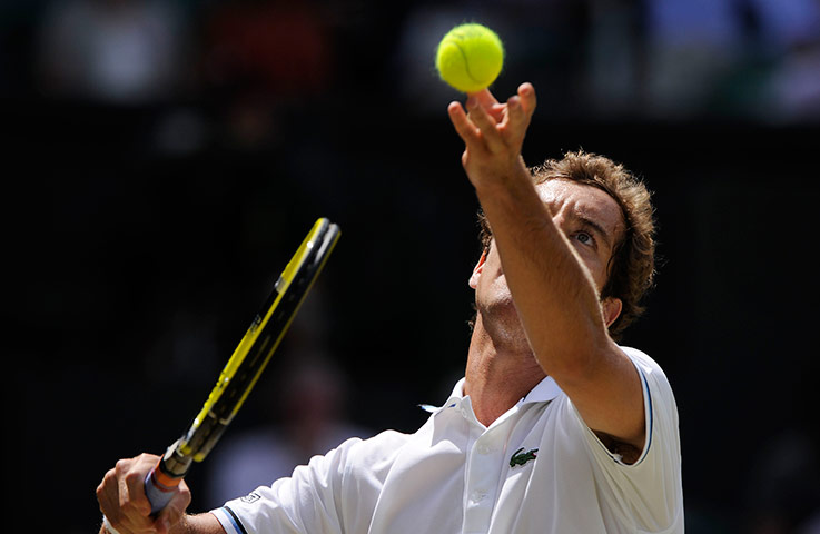 Wimbledon Day Seven: Wimbledon tennis - Murray serving to Gasquet