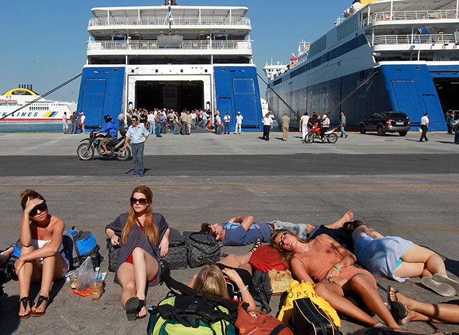 Greece strikes : Tourists tranded at  the port of Piraeus, Greece