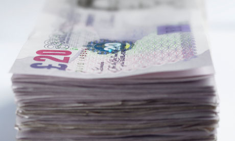 pile of twenty pound notes