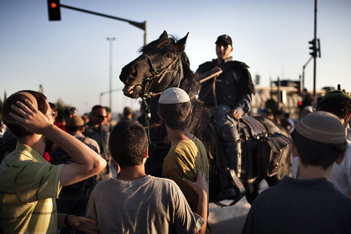 24 hours in pictures: Israeli mounted police disperse right-wing Jewish demonstrators