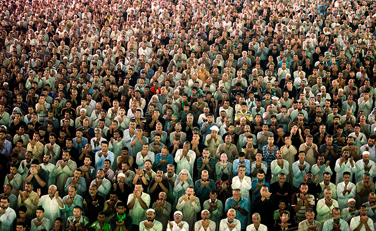 24 hours in pictures: Shiite pilgrims pray at the Imam Moussa al-Kadhim shrine